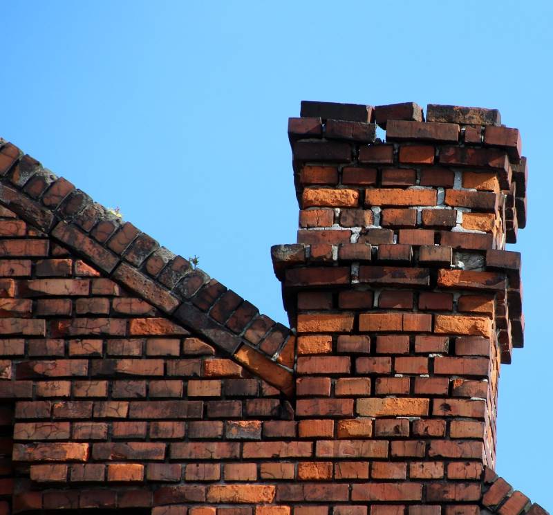 Signs Your West Hills Home Needs a Chimney Inspection Damaged chimney on an West Hills home showing cracks and missing mortar